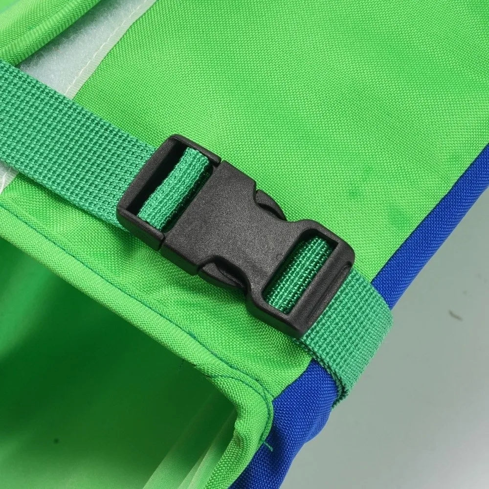 PupFloat dog life jacket flat lay showing chin support float panel and rescue handle